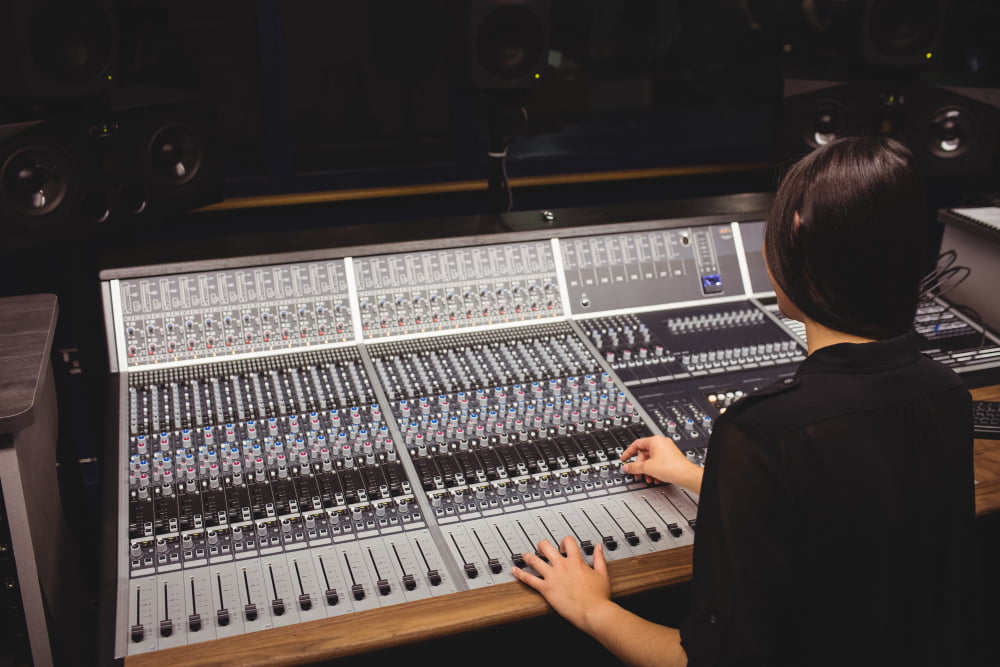 female student using sound mixer 1